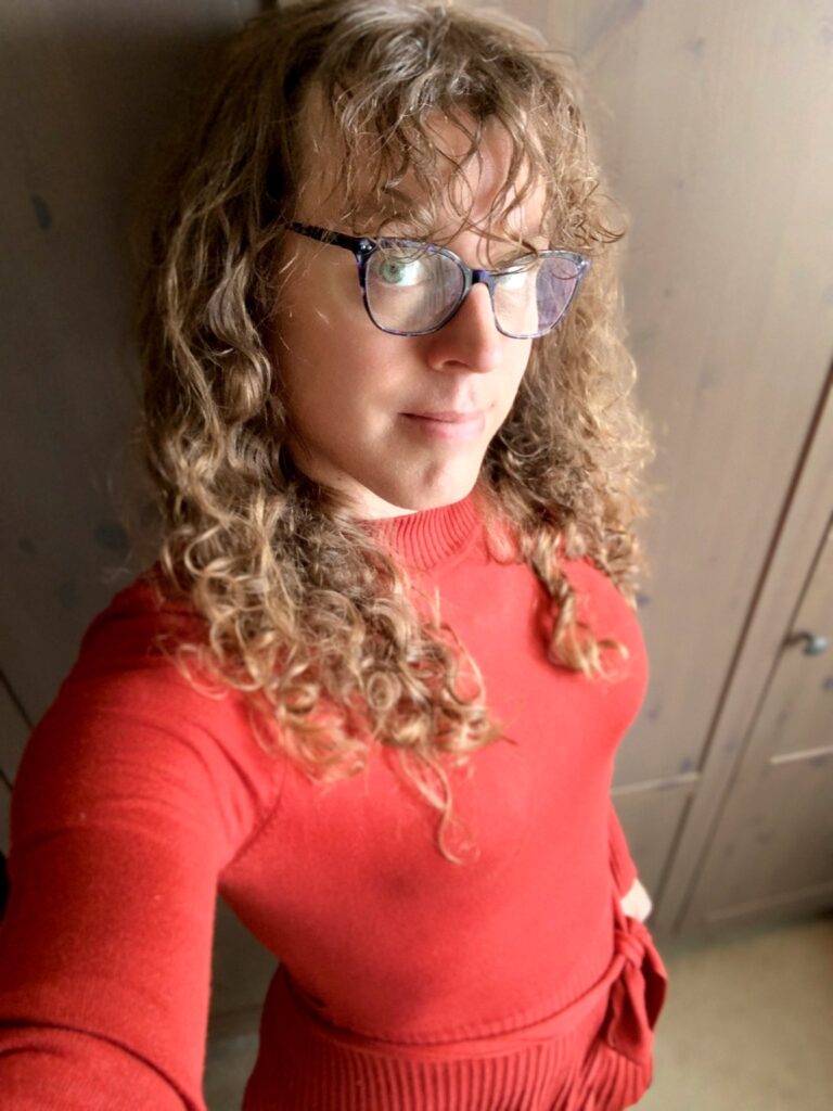 Me in a rusty red-orange dress.