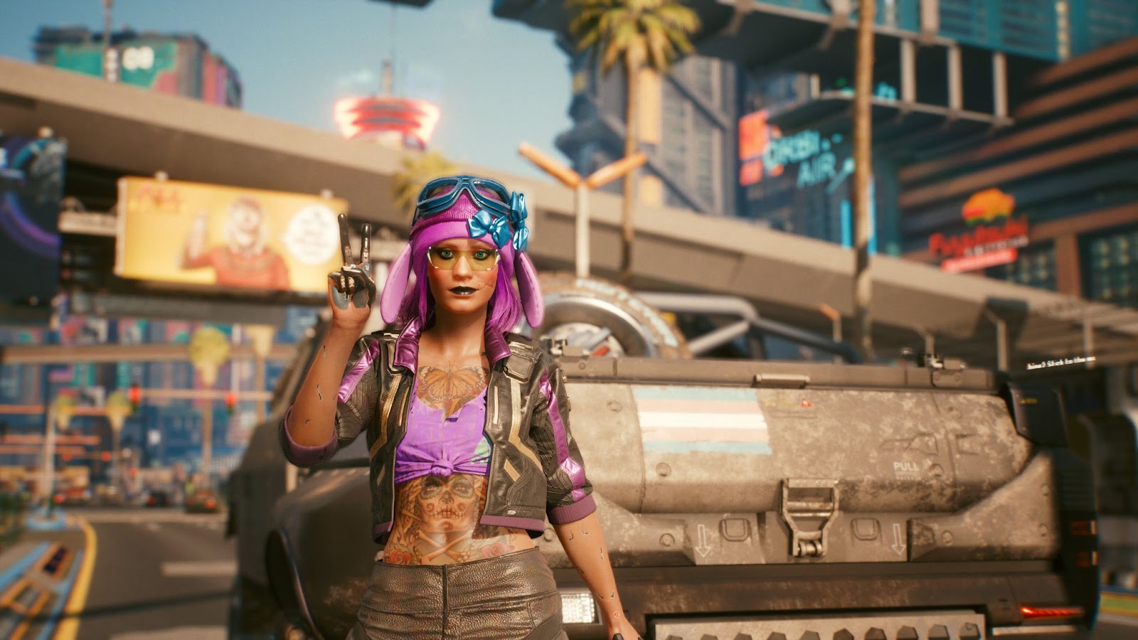 My Cyberpunk 2077 character standing by the trans pride flag on the back of Claire's truck