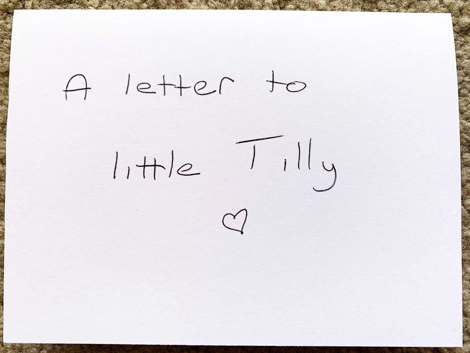 a handwritten note that says "A letter to little Tilly" with a heart