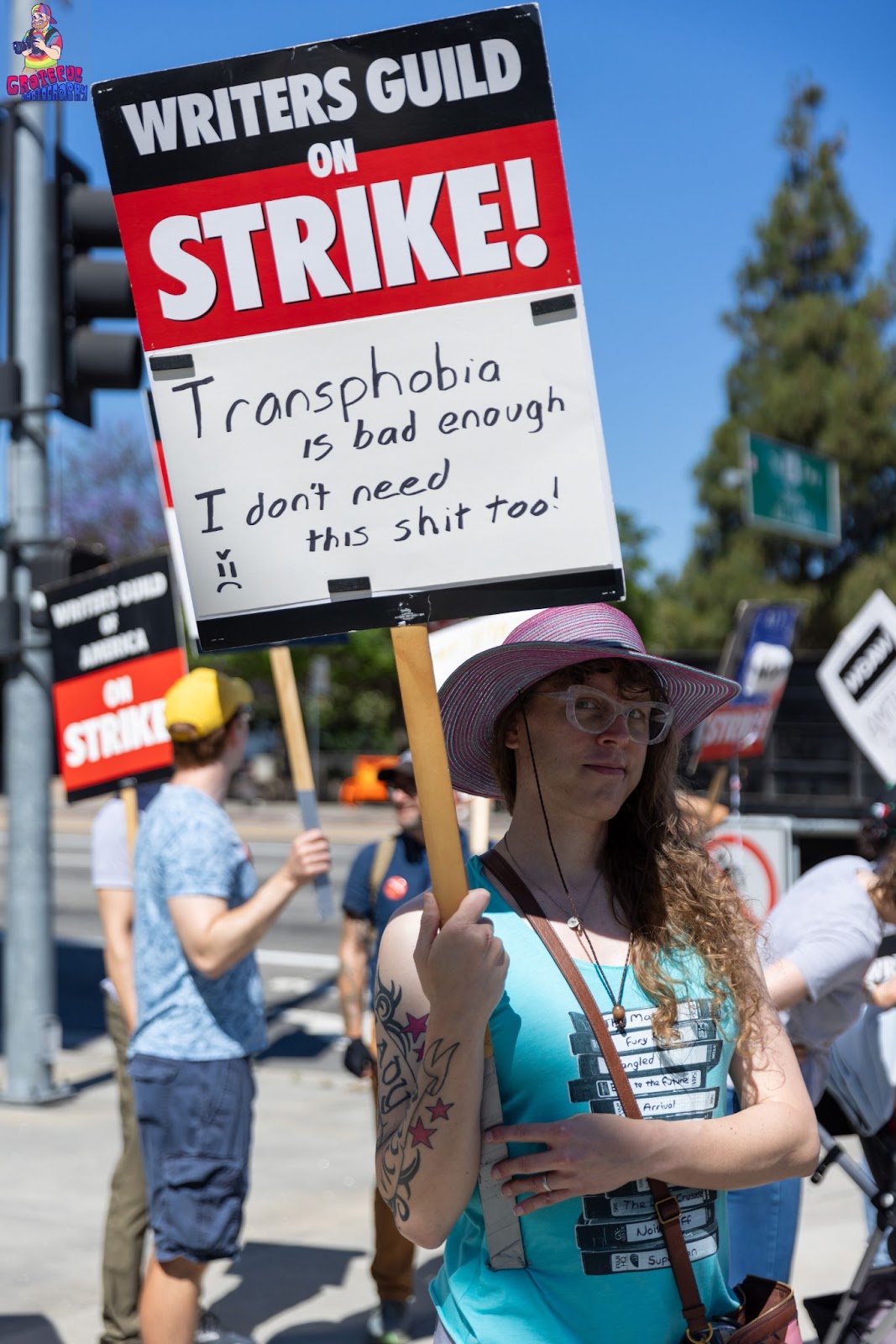 A color photo of me picketing at Universal taken by Patrick Malone