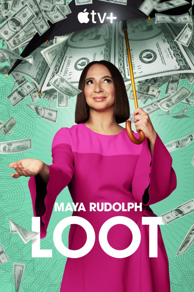 Maya Rudolph in a pink dress under an umbrella as it rains hundred thousand dollar bills with her face on them, in the Loot season 2 promotional poster