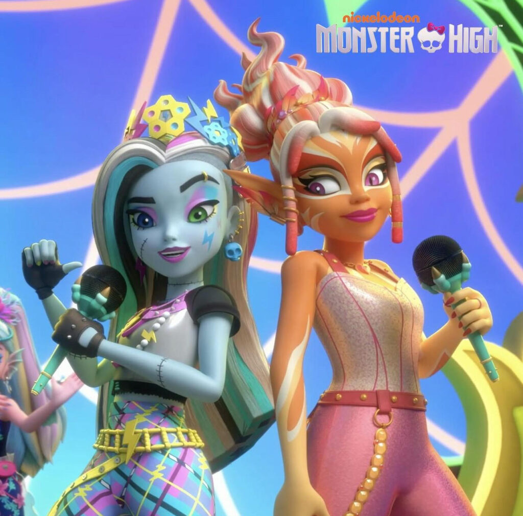 Frankie and Phoenix from Monster High, holding microphones